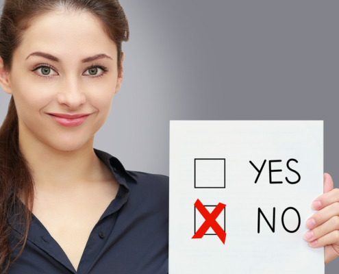 Business Woman Holding Blank And Voting For No In Option